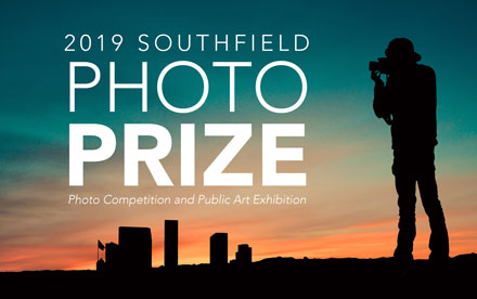 silhouette of a person taking a photo at sunset with text "2019 Southfield Photo Prize"