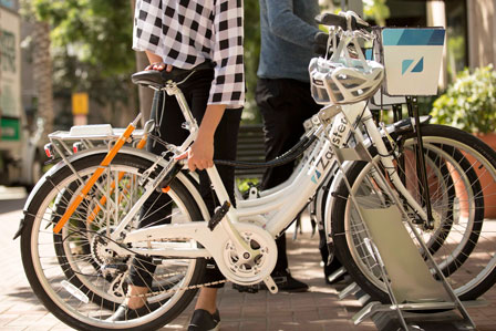 A zapster bike is returned to the rack