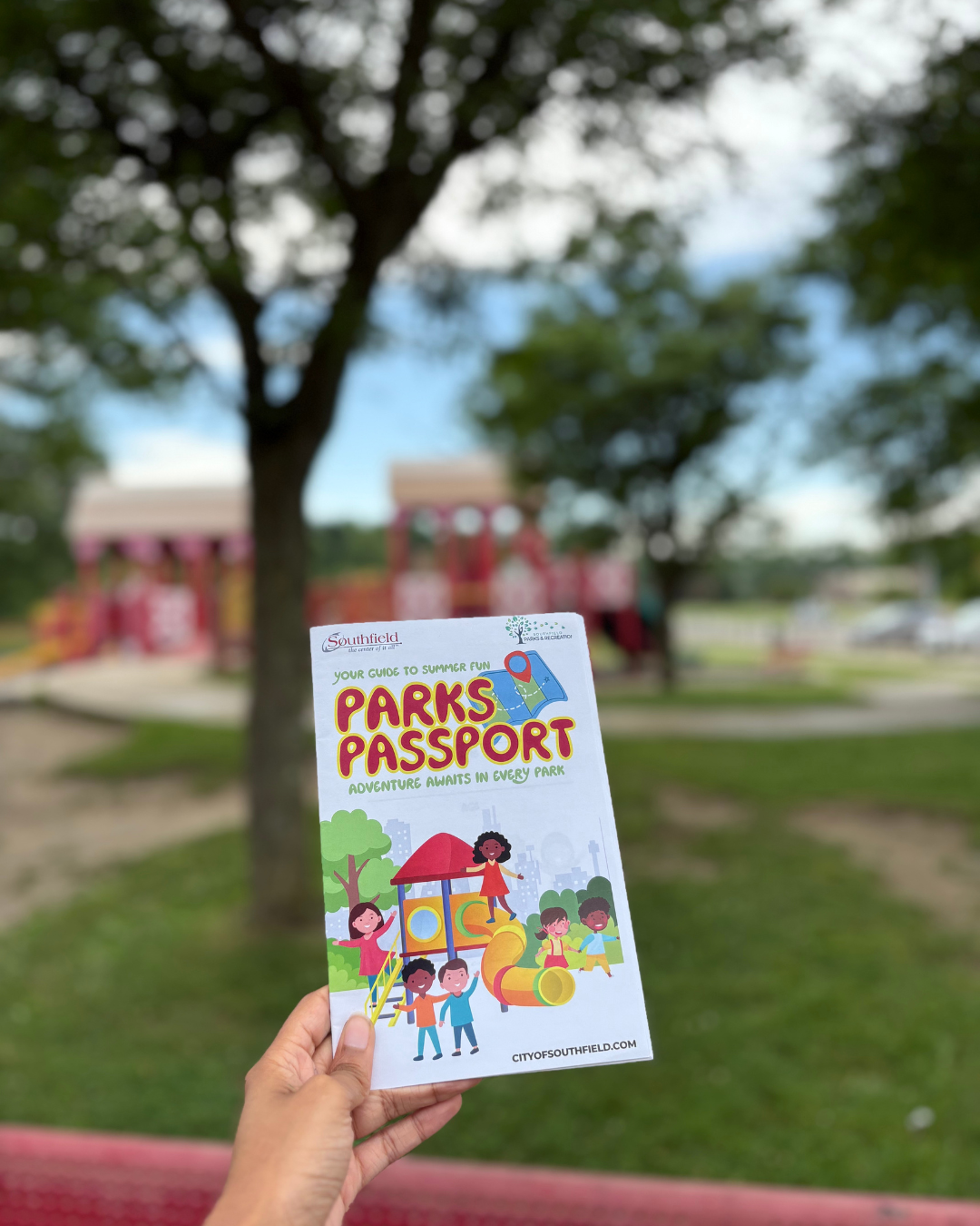picture of a hand holding a Park Passport at Inglenook Park