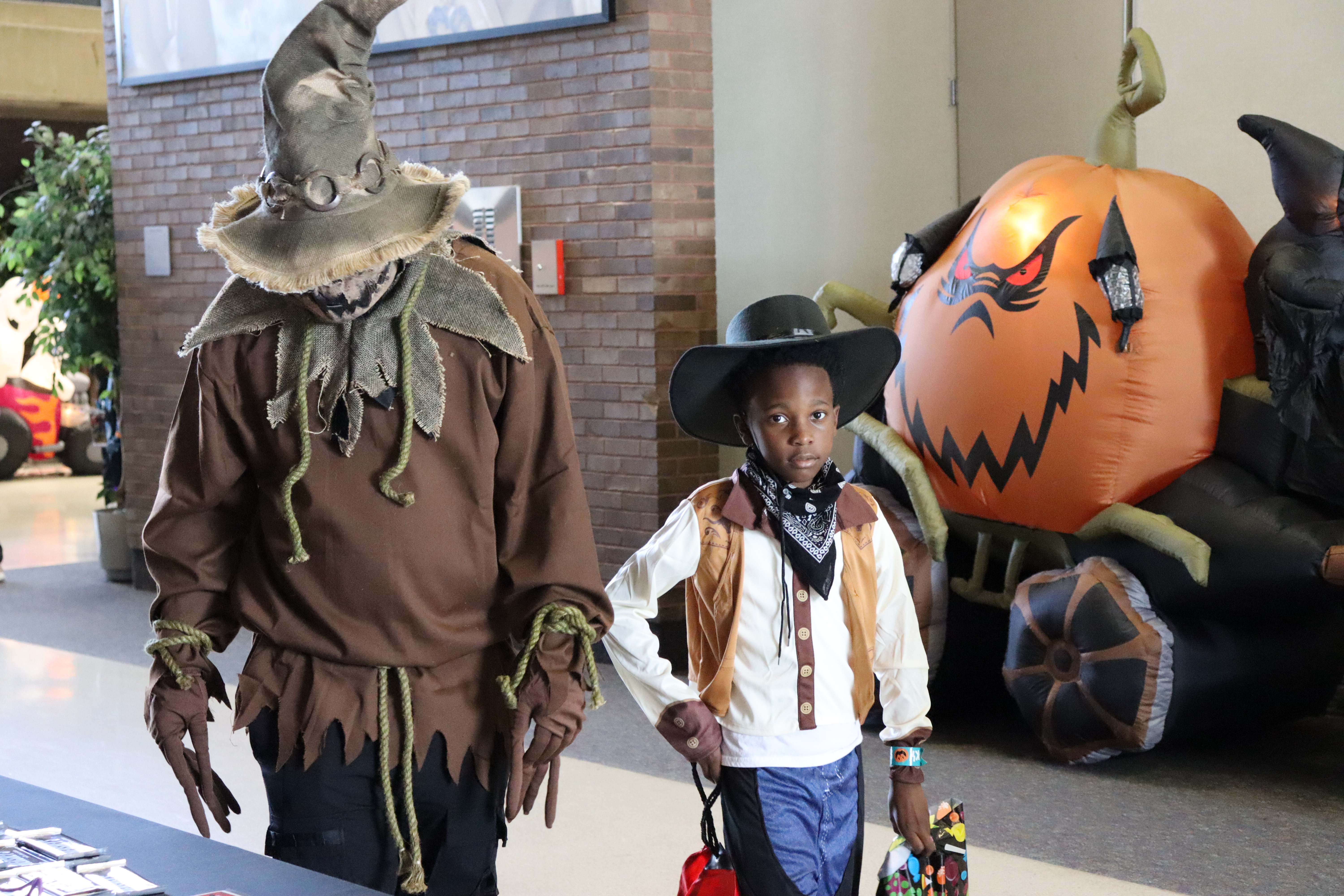 picture of an adult and child dressed for Halloween