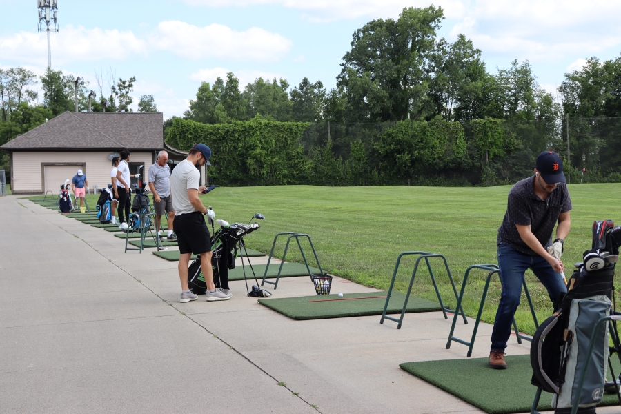 photo of people hitting off the mats at Beech Woods Driving Range